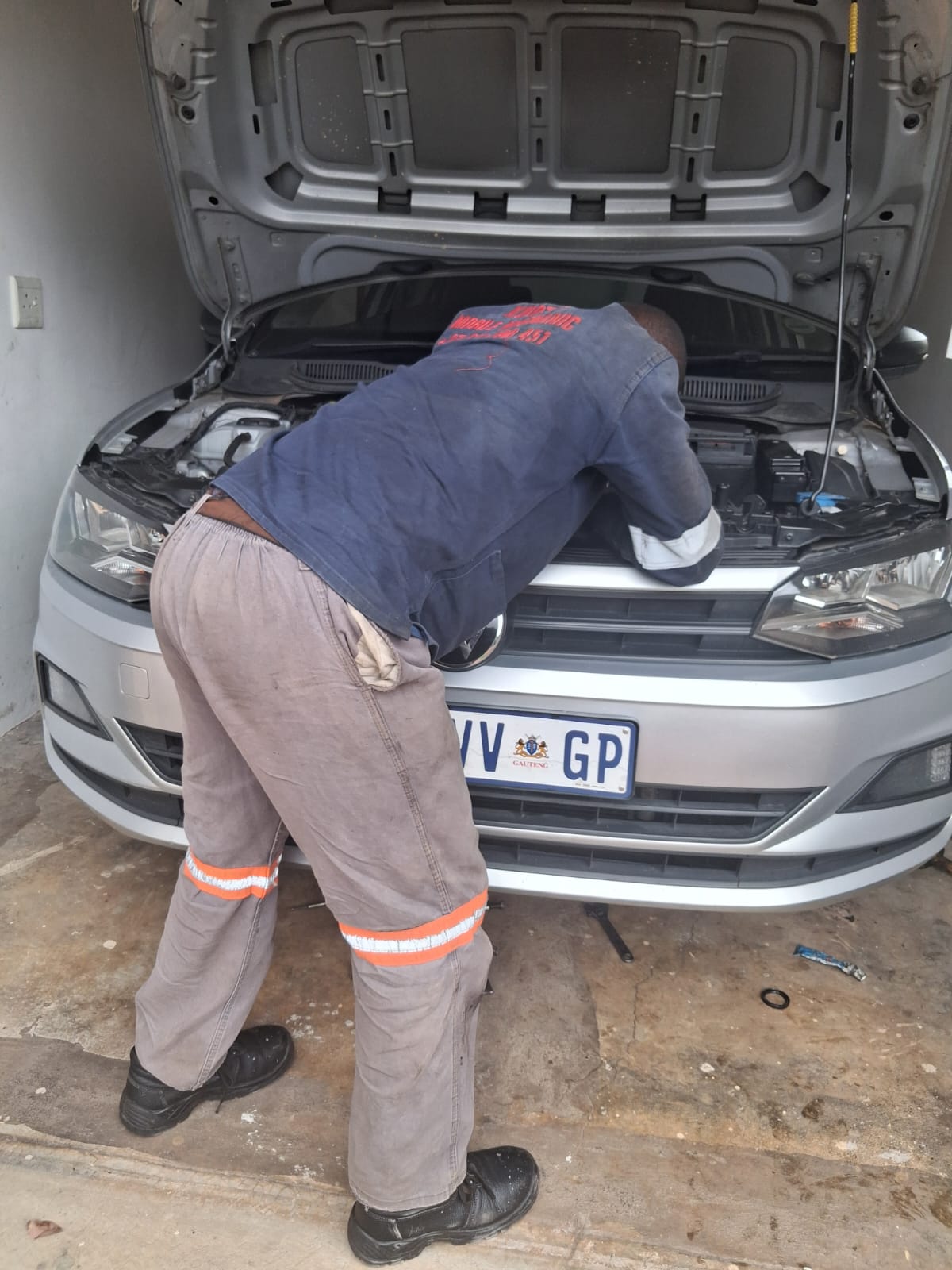 Mechanic working on a vehicle